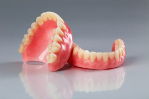 Elderly Care Pittsburgh PA - What Can You Do to Help Your Aging Adult Get Used to Her Dentures?